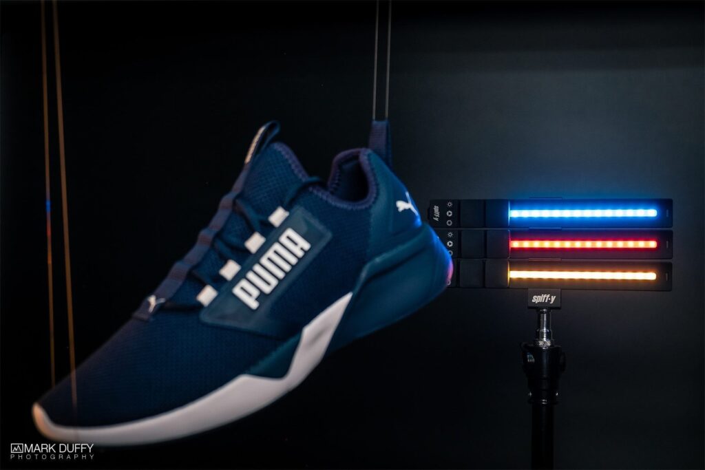 Puma trainer product photography shot with KYU-6 RGB light wraps